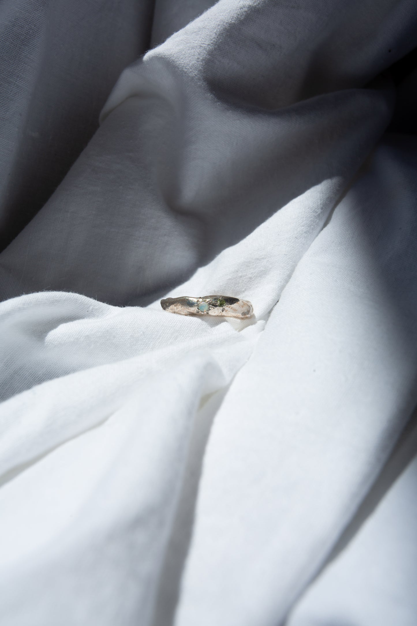silver ring with opal and peridot