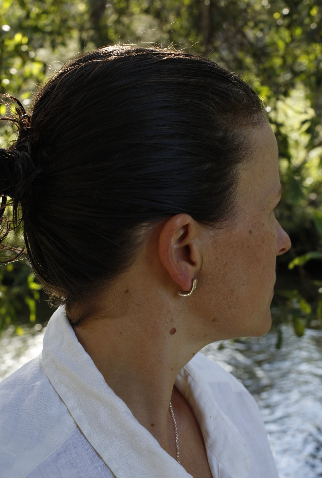 Silver half hoops with blue sapphire