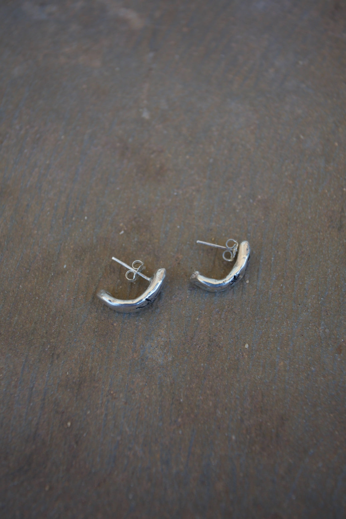 Silver half hoops with blue sapphire