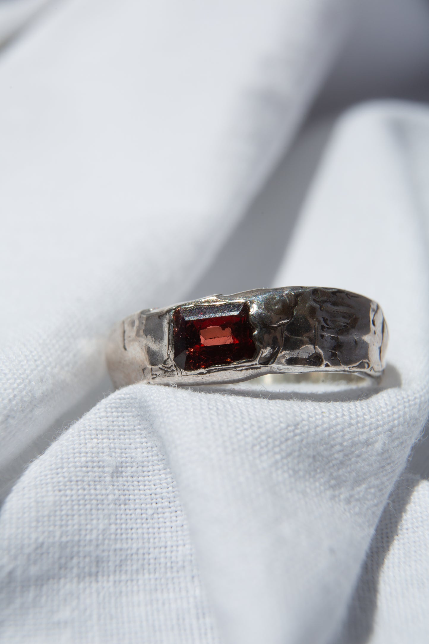 silver ring with garnet