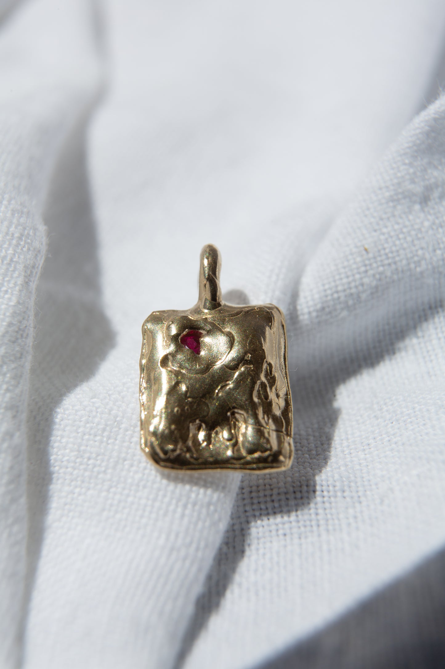 9ct gold pendat with ruby