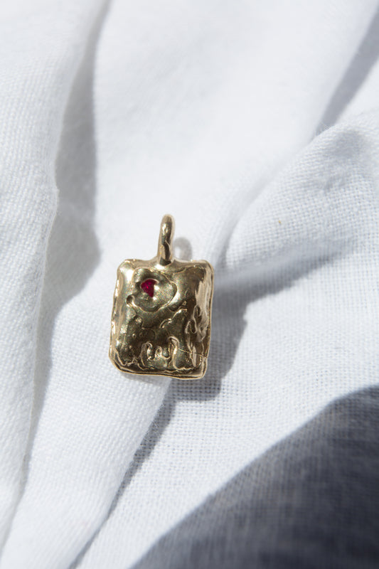 9ct gold pendat with ruby